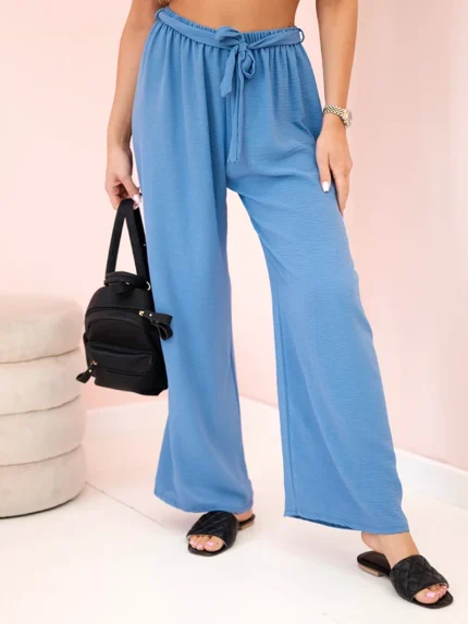 Spodnie z szeroką i wiązaniem w pasie jeansowe