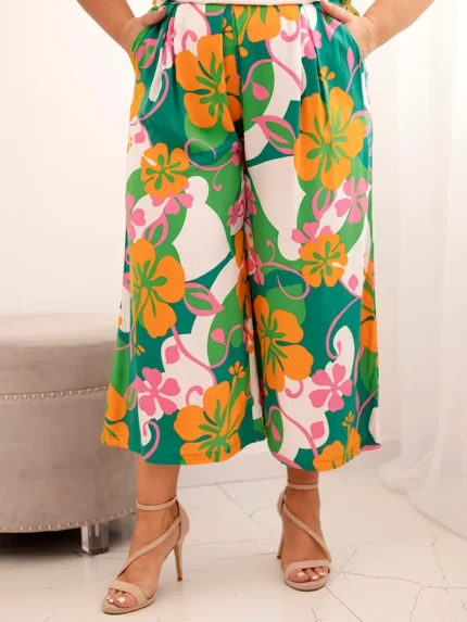 Spodnie damskie Plus Size wiskozowe z kwiatowym wzorem pomarańczowe