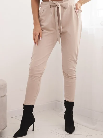 Spodnie damskie bawełniane z wiązaniem w pasie i zwężaną nogawką beżowe
