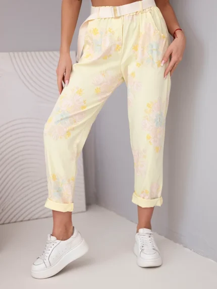 Spodnie damskie wiskozowe w kwiaty z paskiem żółte
