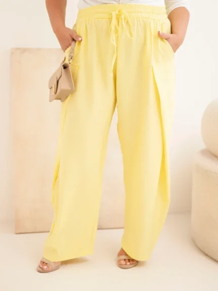 Spodnie damskie bawełniane Plus Size z gumką w pasie żółte